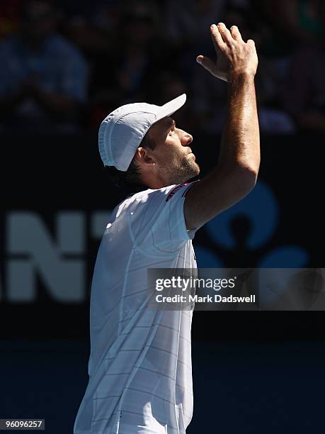 Ivo Karlovic of Croatia celebrates winning the second set in his fourth round match against Rafael Nadal of Spain during day seven of the 2010...