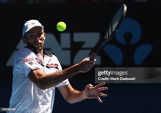 Ivo Karlovic of Croatia plays a forehand in his fourth round match against Rafael Nadal of Spain during day seven of the 2010 Australian Open at...