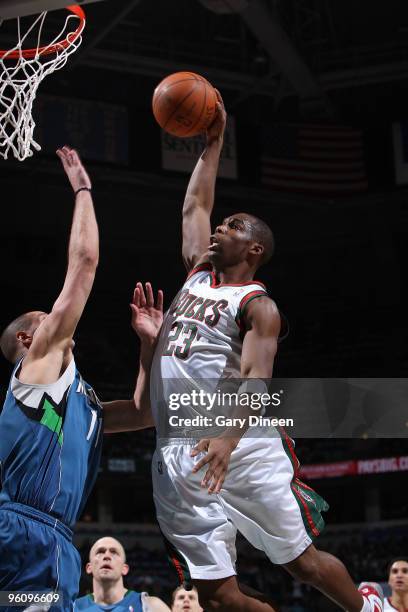 Jodie Meeks of the Milwaukee Bucks is fouled on a dunk attempt by Aleksandar Pavlovic of the Minnesota Timberwolves on January 23, 2010 at the...