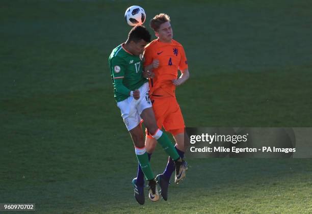 Republic of Ireland's Tyreik Wright and Netheland's Ramon Hendricks battle for the ball