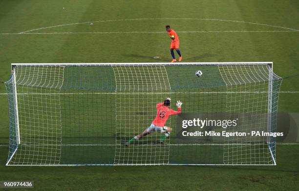 Netherland's Daishawn Redan scores against Republic of Ireland goalkeeper James Corcoran during the penalty shoot out