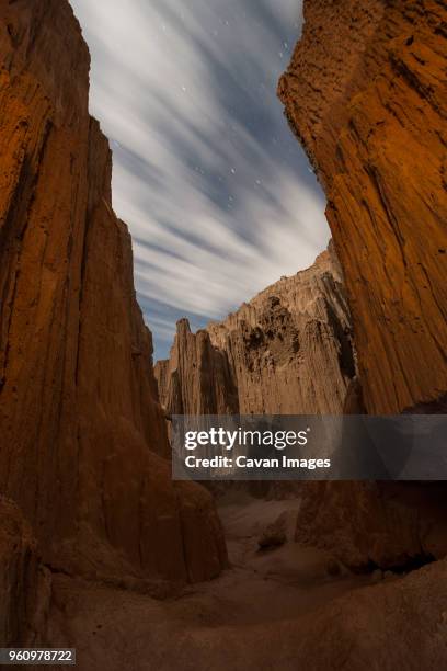 scenic view of slot canyons against cloudy sky at cathedral gorge state park - cathedral gorge stock pictures, royalty-free photos & images