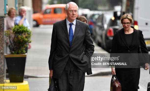 Chairman of the Grenfell Tower Inquiry, retired judge Martin Moore-Bick , leaves after the opening day of the Phase 1 Inquiry hearings into the...