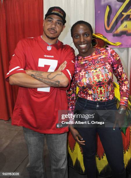 Actress/stunt woman Janeshia Adams-Ginyard of "Black Panther" and Brandon Paxton attend Comic Con Revolution held at the Ontario Convention Center on...