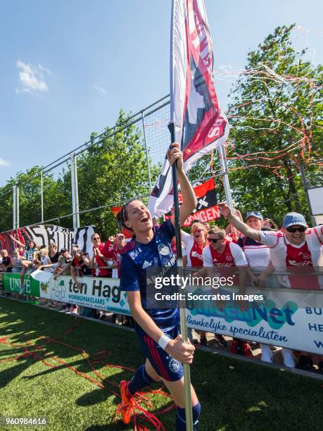 Merel van Dongen of Ajax women celebrates the championship during the Dutch Eredivisie Women match between Fc Twente v Ajax at the Sportpark...