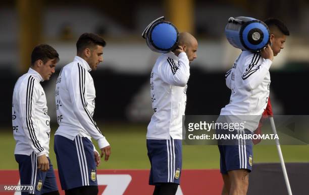 Argentina's football team defender Javier Mascherano defender Eduardo Salvio midfielder Giovani Lo Celso and defender Marcos Rojo take part in a...