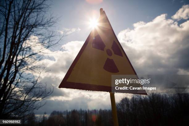 radioactive warning symbol - radiation symbol stock pictures, royalty-free photos & images