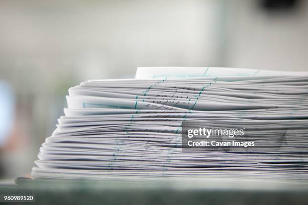 documents on table at laboratory - medical research paper stock pictures, royalty-free photos & images