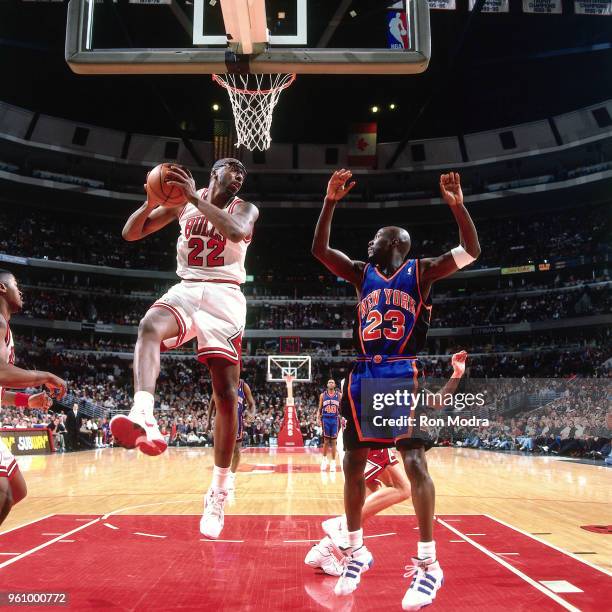 John Salley of the Chicago Bulls grabs the rebound against the New York Knicks on March 21, 1996 at the United Center in Chicago, Illinois. NOTE TO...