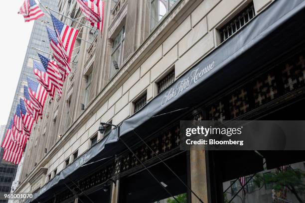 American flags fly outside a Saks Fifth Avenue Inc. Department store in New York, U.S., on Friday, May 18, 2018. Saks Fifth Avenue is breaking with...