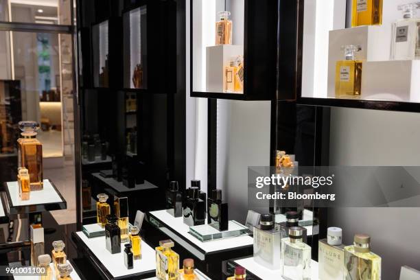 Chanel SA perfume bottles sits on display at the new beauty floor of a Saks Fifth Avenue Inc. Department store in New York, U.S., on Friday, May 18,...