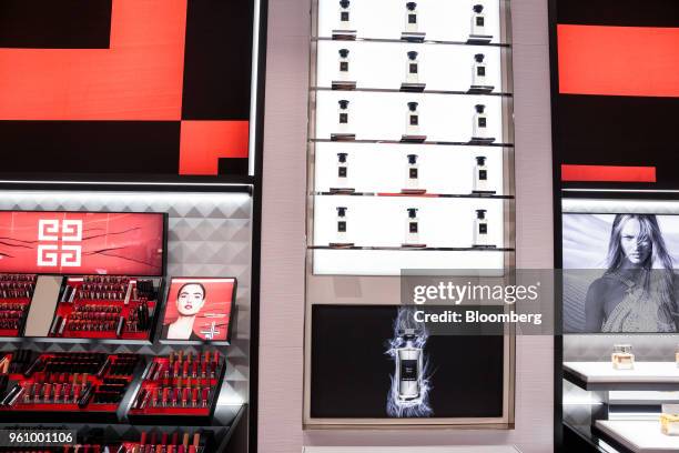 Givenchy SA makeup and perfume bottles sit on display at the new beauty floor of a Saks Fifth Avenue Inc. Department store in New York, U.S., on...