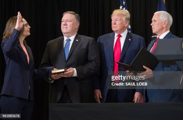 Gina Haspel is sworn in as the Director of the Central Intelligence Agency by US Vice President Mike Pence alongside US President Donald Trump and US...