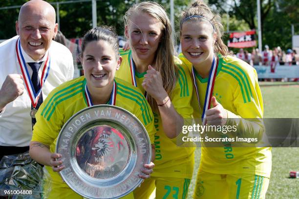 Elixabete Sarasola Nieto of Ajax Women, Marieke Ubachs of Ajax Women, Lize Kop of Ajax Women celebrates the championship with the trophy during the...