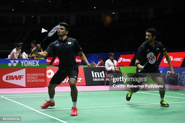 Arjun MR and Ramchandran Shlok of India compete against Matthew Chau and Sawan Serasinghe of Australia during Preliminary Round on day two of the BWF...