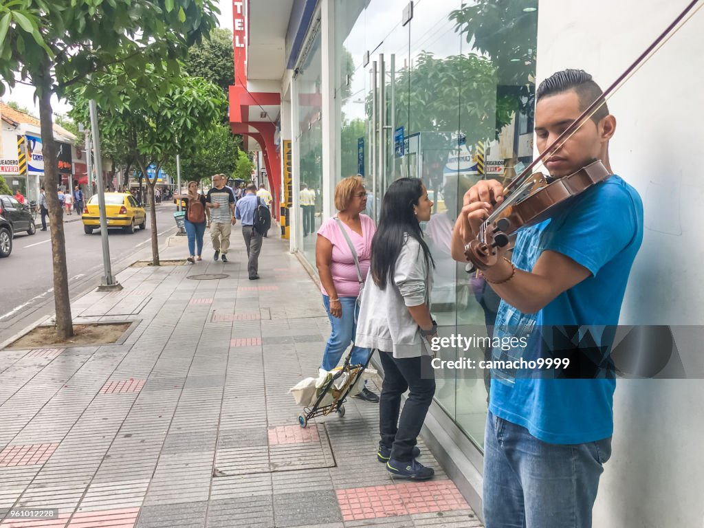 Venezuelan Violin Player in the Streets of Cucuta