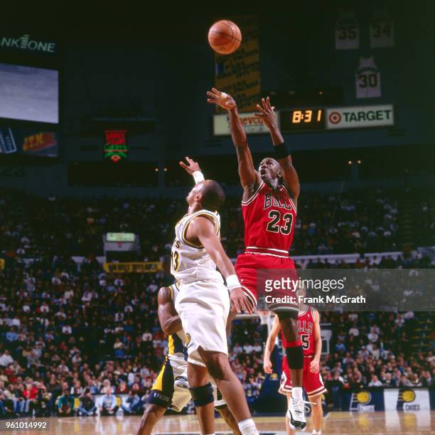 Michael Jordan of the Chicago Bulls shoots the ball against the Indiana Pacers on December 26, 1995 at Market Square Arena in Indianapolis, Indiana....