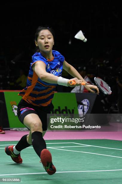 Se Yeon Lee of South Korea competes against Natalia Perminova of Russia during Preliminary Round on day two of the BWF Thomas & Uber Cup at Impact...