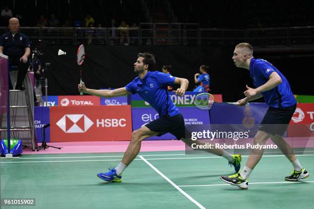 Thom Gicquel and Ronan Labar of France compete against Liu Cheng and Zhang Nan of China during Preliminary Round on day two of the BWF Thomas & Uber...