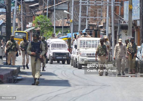 Police enforcers stay alert as the Pro-Freedom activists march towards Lal Chowk in Srinagar, Indian Administered Kashmir. The valley observed...