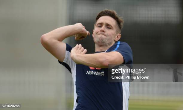 Chris Woakes bowls during a training session before the 1st Test match between England and Pakistan at Lord's cricket ground on May 21, 2018 in...