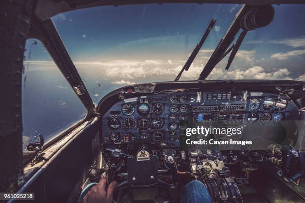 low section of pilot flying airplane - aeroplane dashboard stock pictures, royalty-free photos & images