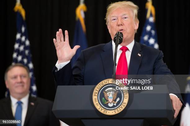 President Donald Trump speaks alongside US Secretary of State Mike Pompeo during the swearing-in ceremony for Gina Haspel as Director of the Central...