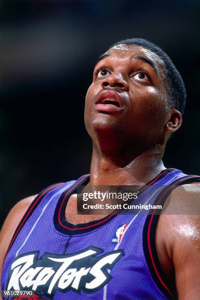 Oliver Miller of the Toronto Raptors looks on during the game against the Chicago Bulls on November 7, 1995 at the United Center in Chicago,...