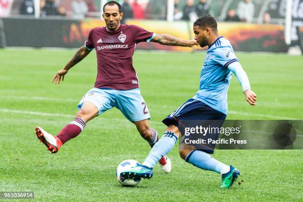 Ismael Tajouri-Shradi of NYCFC controls ball during regular MLS game against Colorado Rapids at Yankee stadium held under rain NYCFC won 4 - 0.