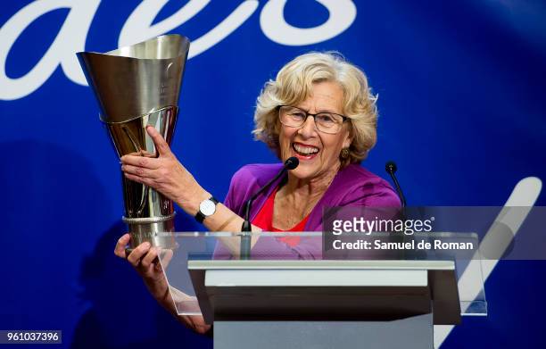 Mayor of Madrid Manuela Carmena speaks during the Real Madrid basketball team celebration after they won The Euroleague on May 21, 2018 in Madrid,...