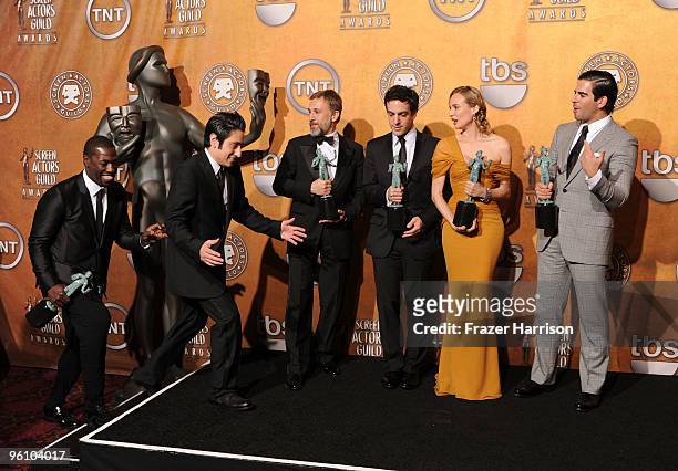 Actors Jacky Ido, Omar Doom, Christoph Waltz, B.J. Novak, Diane Kruger and Eli Roth pose with the Cast In A Motion Picture award for 'Inglourious...
