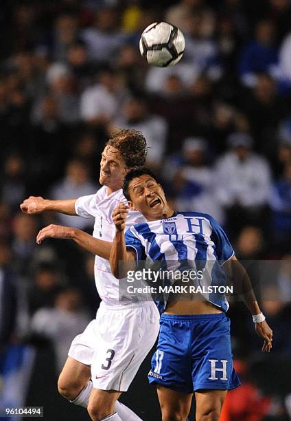 Clarence Goodson of the US clashes with Roger Espinoza of Honduras during their international friendly at the Home Depot Center Stadium in Los...