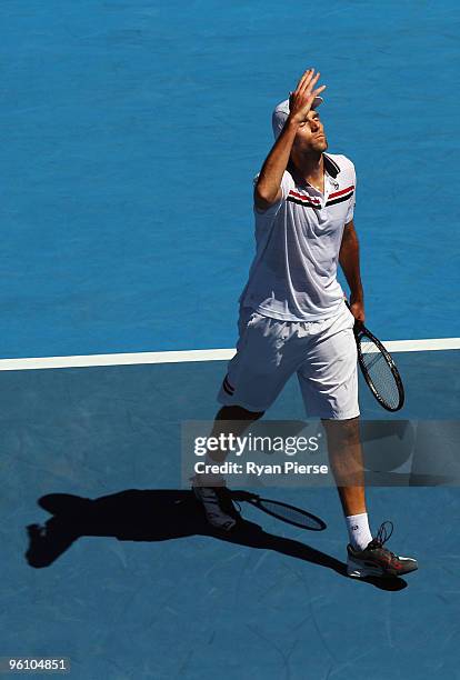 Ivo Karlovic of Croatia celebrates winning the second set in his fourth round match against Rafael Nadal of Spain during day seven of the 2010...