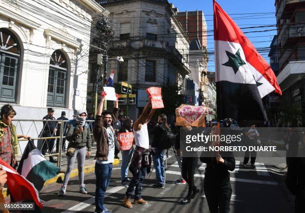 Activists demonstrate outside the Paraguayan Foreign Minister in Asuncion, to protest against the inauguration of the Paraguayan embassy in Jerusalem...