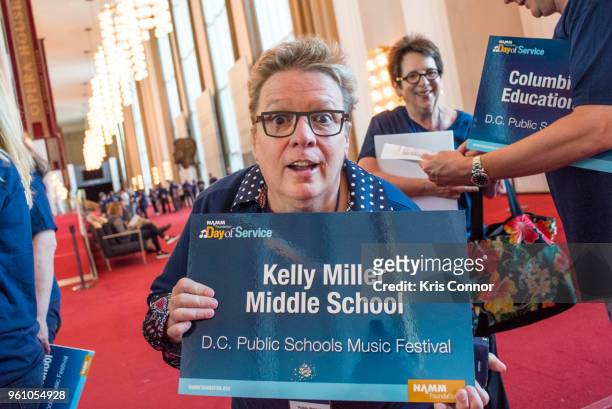National Association of Music Merchant volunteer Robin Walenta poses for a photo during the NAMM Day Of Service With DC Public Schools Music Festival...