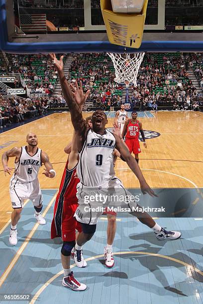Ronnie Brewer of the Utah Jazz goes up for the rebound against the New Jersey Nets at EnergySolutions Arena on January 23, 2010 in Salt Lake City,...