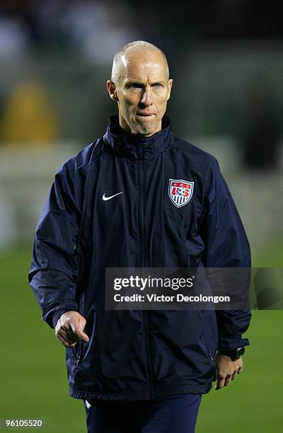 Head Coach Bob Bradley of USA walks off the pitch after a 3-1 loss to Honduras in their international friendly on January 23, 2010 in Carson,...