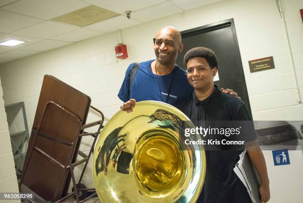 National Association of Music Merchant volunteers help students during the NAMM Day Of Service With DC Public Schools Music Festival At The Kennedy...