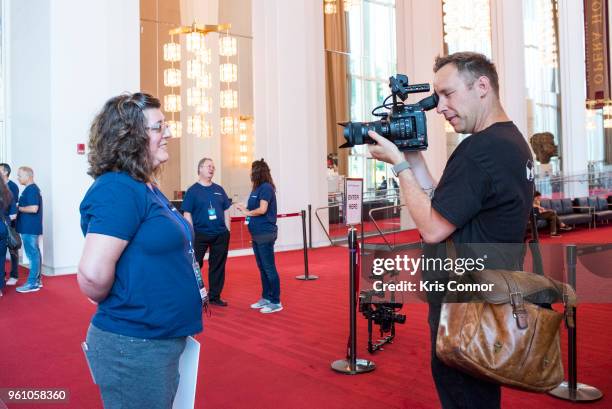 National Association of Music Merchant volunteer Beth Schiemer help students during the NAMM Day Of Service With DC Public Schools Music Festival At...