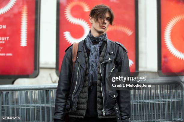 Model Francois Xavier wears a black leather jacket during Paris Fashion Week Mens Fall Winter 2018 on January 21, 2018 in Paris, France.