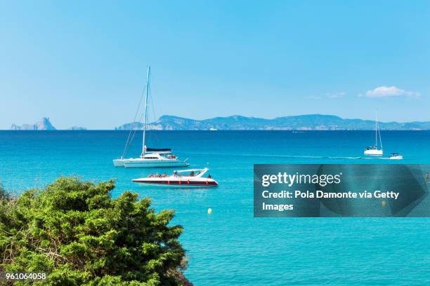 idyllic beach of cala saona from high view angle, formentera coastline in balearic islands, spain - pola damonte stockfoto's en -beelden