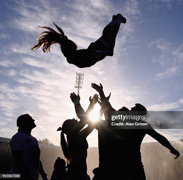 Cheerleaders perform prior to the Bundesliga Playoff Leg 2 match between Holstein Kiel and VfL Wolfsburg at Holstein-Stadion on May 21, 2018 in Kiel,...