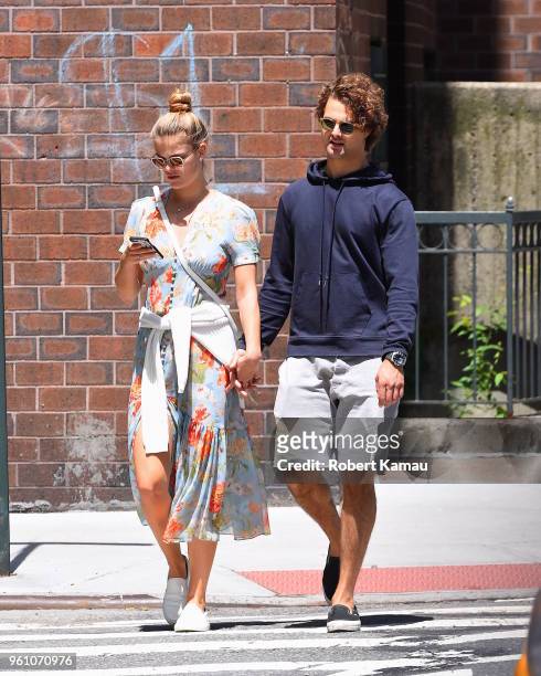Nina Agdal and Jack Brinkley-Cook walking in Manhattan on May 21, 2018 in New York City.