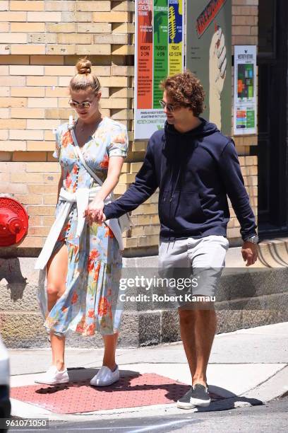 Nina Agdal and Jack Brinkley-Cook walking in Manhattan on May 21, 2018 in New York City.