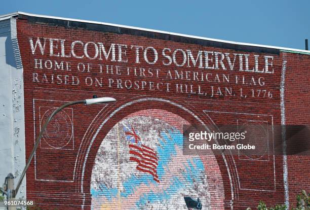 Wall mural is pictured in Union Square in Somerville, MA on May 9, 2018. A new federal tax break designed to boost low-income neighborhoods could...