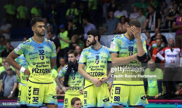 Adrien Dipanda , Alexian Trottet , Nicolas Krakowski and Wissem Hmam look dejected after the Ottostadt Magdeburg EHF Cup Final Four 2018 first place...