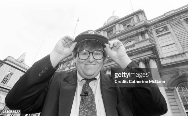 American filmmaker Michael Moore, outside City Hall, during taping of an episode of Moore's NBC television series 'TV Nation' in May 1994 in New York...