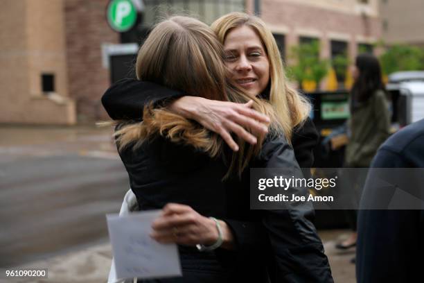 Emily Murray 20, a junior at CU Boulder is hugged by Jennifer Pennell as she meets with her foster family to celebrate her 20th birthday with her...