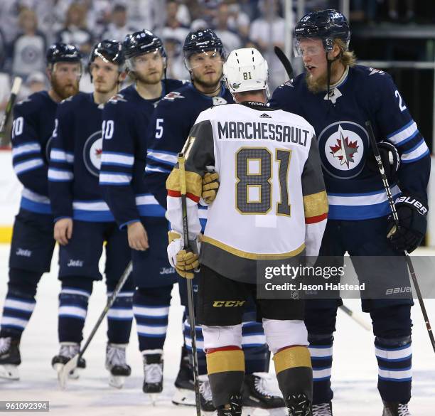Patrik Laine of the Winnipeg Jets congratulates Jonathan Marchessault of the Vegas Golden Knights after Game Five of the Western Conference Finals...