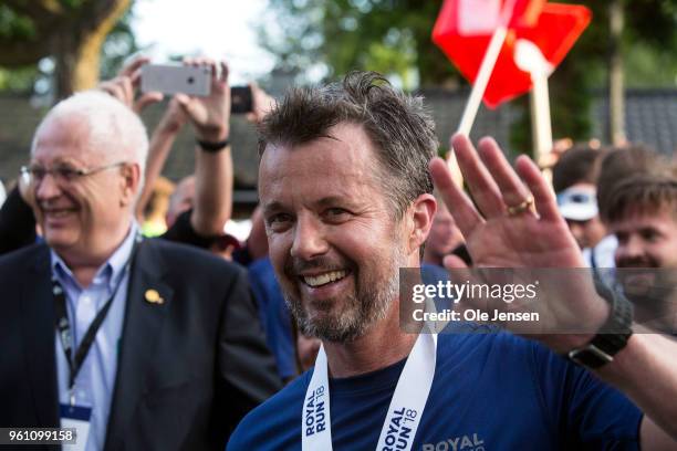 Crown Prince Frederik of Denmark waves after finishning the Royal Run on May 21, 2018 in Copenhagen, Denmark. The Royal Run took place in the cities...